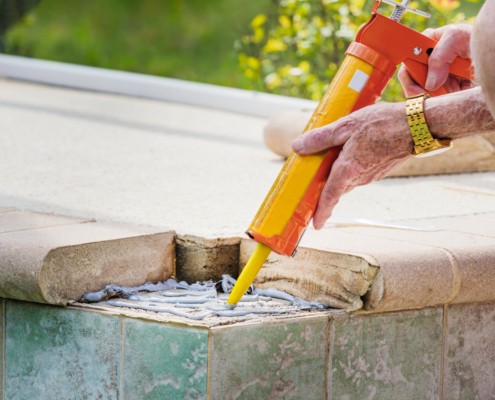 Can Pavers Be Glued to Concrete